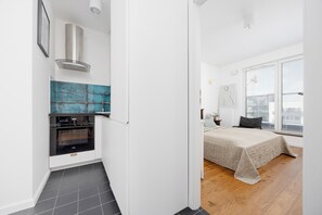 Appartamento, 2 camere da letto, balcone | Cucina privata | Forno, macchina per tè/caffè, bollitore elettrico, freezer