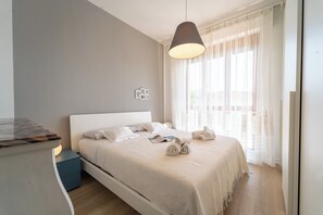 1 chambre, fer et planche à repasser, lits bébé (en supplément)