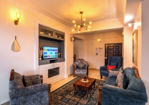 Luxury Apartment, 4 Bedrooms, Mountain View | Living area | 42-inch Smart TV with digital channels, toys, pay movies - The Sunset Abode Shimla 4BR Valley Views (Shimla)