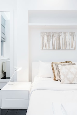 2 habitaciones, tabla de planchar con plancha y cuna de viaje