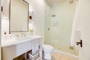 Shower, eco-friendly toiletries, hair dryer, towels
