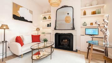 Apartment (1 Bedroom) | Living area | 32-inch Smart TV with digital channels