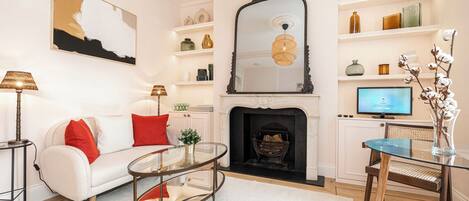 Apartment (1 Bedroom) | Living area | 32-inch Smart TV with digital channels