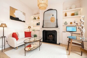 Apartment (1 Bedroom) | Living area | 32-inch Smart TV with digital channels