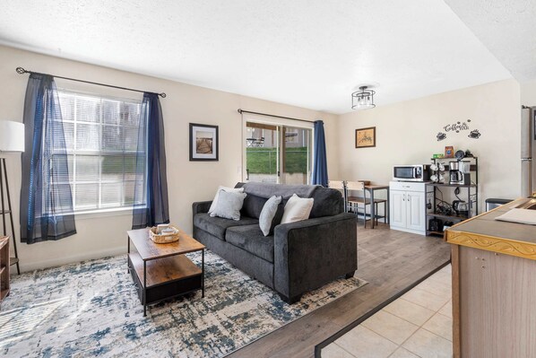 Condo, 1 King Bed with Sofa bed, Patio, Garden View (The Nautical Nook) | Living area