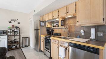 Condo, 1 King Bed with Sofa bed, Patio, Garden View (The Nautical Nook) | Private kitchen