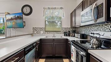 Townhome, Multiple Beds, Patio, Garden View (Mickey’s Oasis At Regal Palms) | Private kitchen | Coffee/tea maker