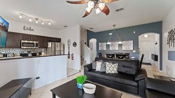 Townhome, Multiple Beds, Patio, Garden View (Mickey’s Oasis At Regal Palms) | Living area | 42-inch flat-screen TV with digital channels