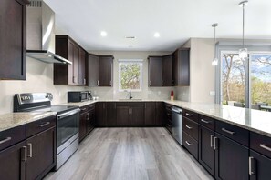 Casa, varias camas, acceso a la alberca (Tuscany Golf View) | Cocina privada | Refrigerador con congelador, microondas y parrilla de estufa