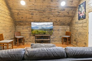 Cabin, Multiple Beds, Hot Tub, Mountain View (Ava’s Hideaway) | Living area | 65-inch flat-screen TV with digital channels, fireplace - Cabin w/ Hot Tub & Game Room in the Smokys! (Sevierville)