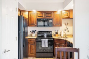 Condo, Multiple Beds, Balcony (Lakefront Oasis) | Private kitchen