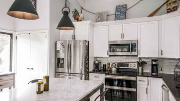 Townhome, Multiple Beds, Pool Access, Garden View | Private kitchen | Coffee/tea maker