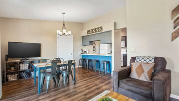 Condo, 1 King Bed with Sofa bed, Pool Access, Golf View (Luxurious Golf Front) | Living area | 42-inch flat-screen TV with digital channels