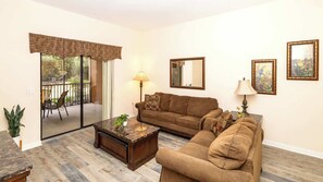 Condo, Multiple Beds, Patio, Garden View (Tranquil Breeze At Caribe Cove) | Living area | 42-inch flat-screen TV with digital channels - Tranquil Breeze at Caribe Cove (Kissimmee)