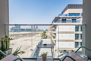 Outdoor dining - Charming 1BR Apartment in Azizi Gardens Nad Al Sheba by Deluxe Holiday Homes (Dubai)