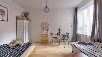 Condo Confort | 1 habitación, tabla de planchar con plancha, wifi gratis y ropa de cama