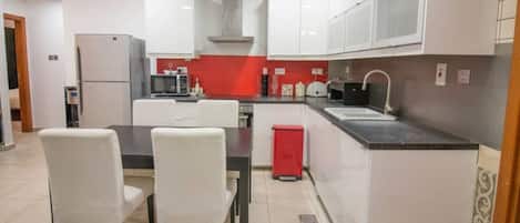 Fridge, microwave, oven, stovetop