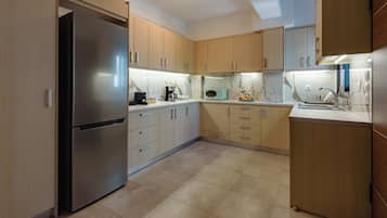 Superior Apartment, City View | Private kitchen | Full-sized fridge, microwave, espresso maker, coffee/tea maker