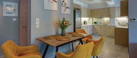 A modern kitchen with wooden cabinets, a built-in oven, and a microwave.