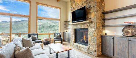 Smart TV, fireplace, books, stereo