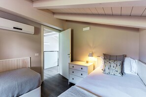 Appartement | Literie de qualité, couette en duvet, fer et planche à repasser