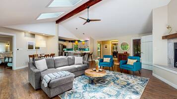 TV, fireplace, books