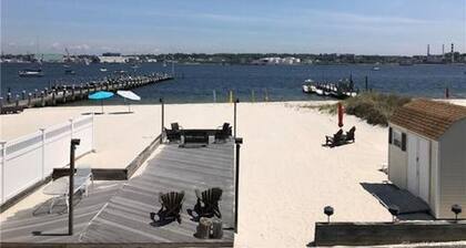 Beachfront Bliss: Water Front, Steps to Sand, Minutes from Dining & Attractions!