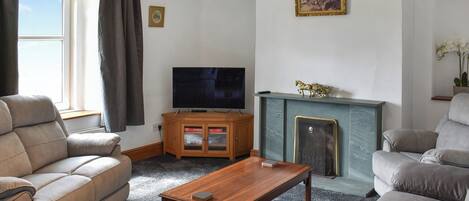 Fernseher, Kamin