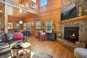 Älytelevisio, takka, videopelejä, pöytätennispöytä