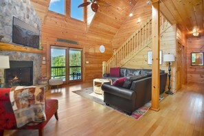 Älytelevisio, takka, videopelejä, pöytätennispöytä