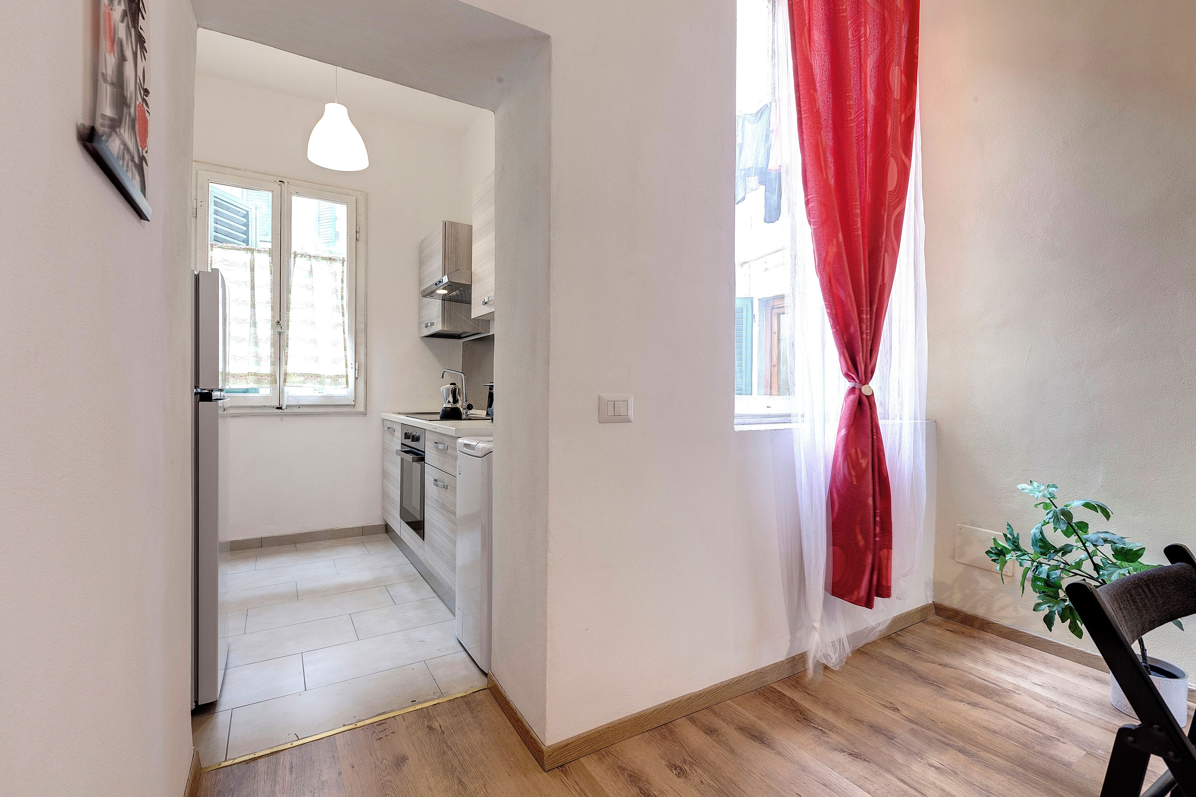 Alice Apartment | Living area | 24-inch flat-screen TV with digital channels