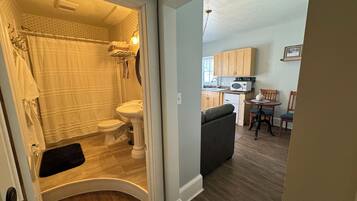 Deluxe Suite, Mountain View | Bathroom | Towels, soap, shampoo, toilet paper