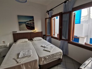 Habitación estándar con 1 cama matrimonial o 2 individuales | Wifi gratis y ropa de cama