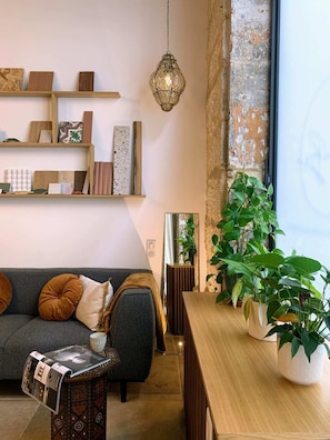 Design Apartment, City View, Ground Floor | Living area | 55-inch flat-screen TV with cable channels, Netflix, streaming services - Home Chic Home Les Suites de La Comédie (Montpellier)