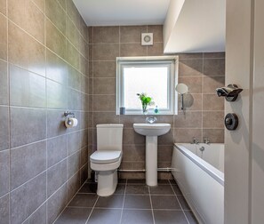 Shower, towels, toilet paper