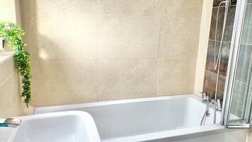 Hair dryer, bidet, towels, soap