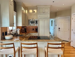 Fridge, microwave, oven, stovetop - Modern beachfront condo with private deck, harbor views, and parking! (Provincetown)