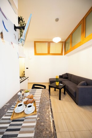 Apartment | Living area | 35-inch TV with digital channels - Casa Creanza by Wonderful Italy (Bari)