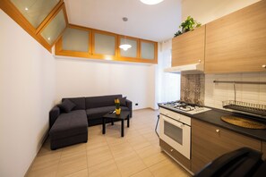 Apartment | Living area | 35-inch TV with digital channels - Casa Creanza by Wonderful Italy (Bari)