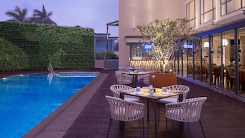 Outdoor pool, pool umbrellas, pool loungers