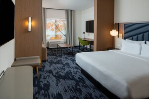 Individually furnished, desk, laptop workspace, iron/ironing board