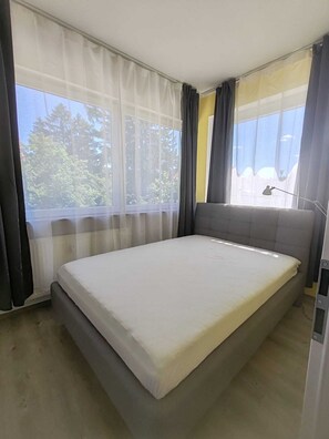4 bedrooms, iron/ironing board, travel cot, WiFi