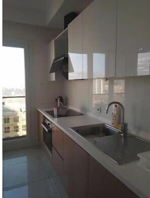 Fridge, microwave, stovetop, cookware/dishes/utensils