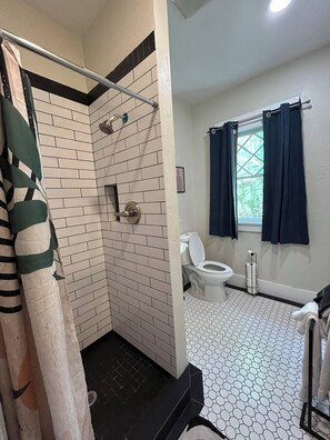 Shower, hair dryer, towels, soap