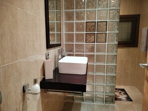 Shower, towels, soap, shampoo