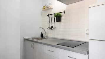 Fridge, microwave, stovetop, coffee/tea maker