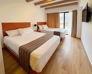 Deluxe-paritalo, 1 makuuhuone | 1 makuuhuone, minibaari, ilmainen Wi-Fi, vuodevaatteet