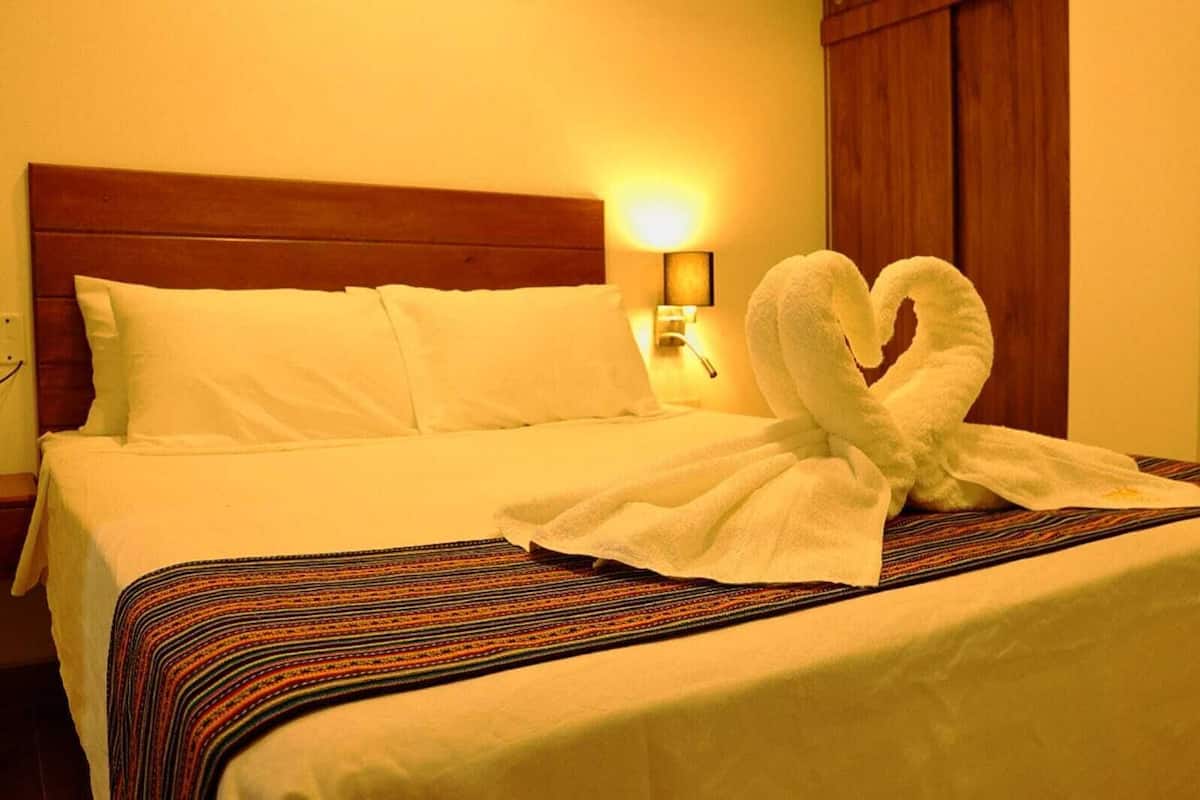 Deluxe Apartment, 1 Queen Bed, River View | 1 bedroom, minibar, WiFi (free), bed sheets