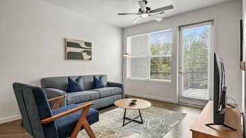 Classic Apartment (Self Check-in with Virtual Front Desk) | Living area | 43-inch flat-screen TV with digital channels