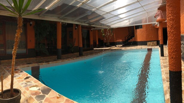 30-inch flat-screen TV with cable channels, first-run movies, pay movies - Alebrije Hotel boutique (Amanalco de Becerra)